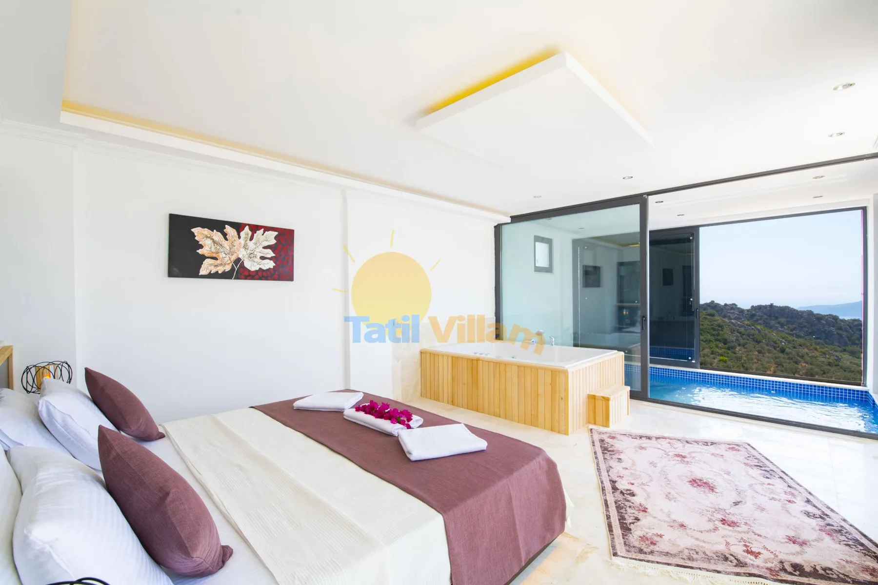 A bright bedroom with a neatly made bed and sliding glass doors opening onto a pool view.