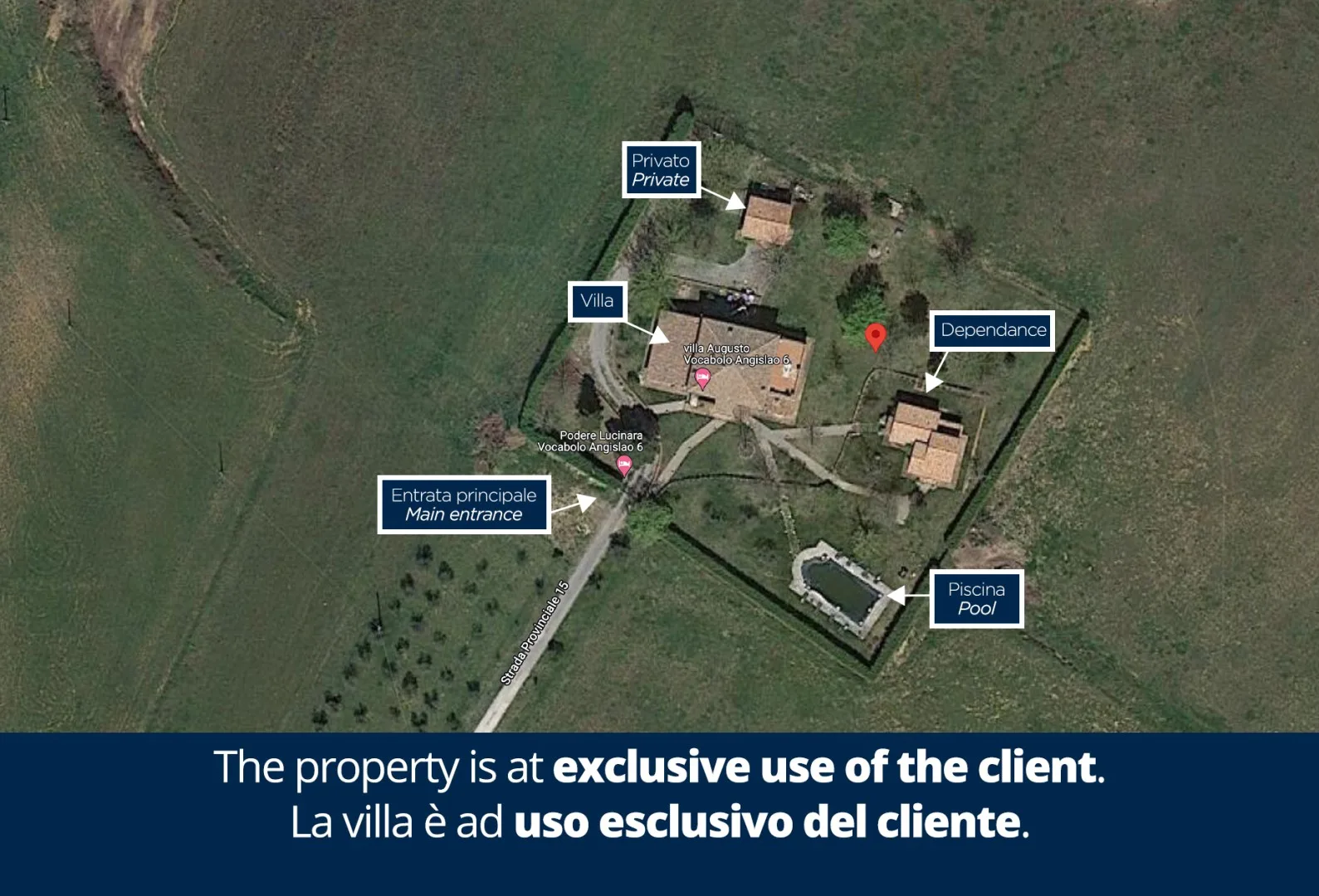 Una vista aérea muestra varios edificios, senderos, campos alrededor y áreas señalizadas dentro de una propiedad cercada.