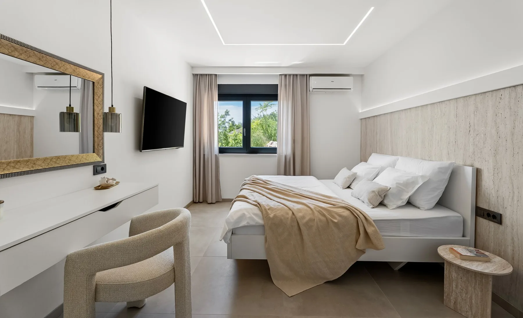 A modern bedroom with a double bed, bedside tables, a window, and a dressing table with a mirror.