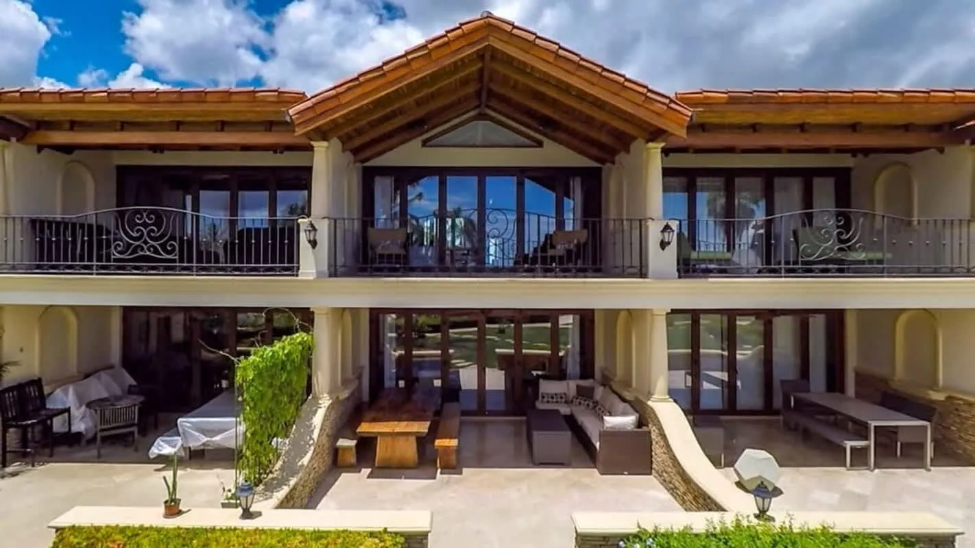 Shared amenity: A two-story building with balconies and a covered patio.