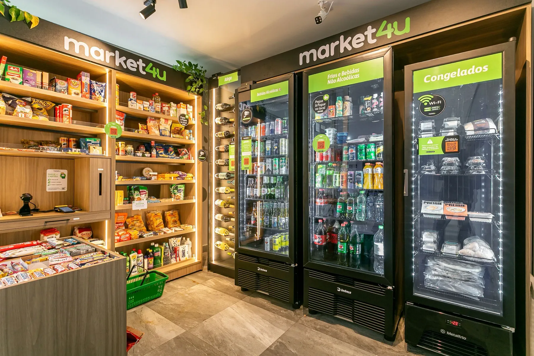Shared amenity: A convenience store with shelves of snacks and refrigerated drink cases.