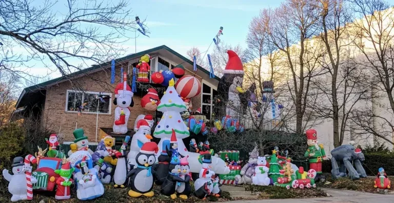 Representative hotel space: A house is surrounded by colorful holiday inflatables and lawn decorations.
