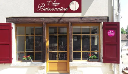 Representative hotel space: Restaurant storefront with red shutters and a central entrance.