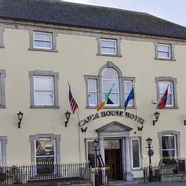 Representative hotel space: A hotel entrance with flags displayed above the doorway.