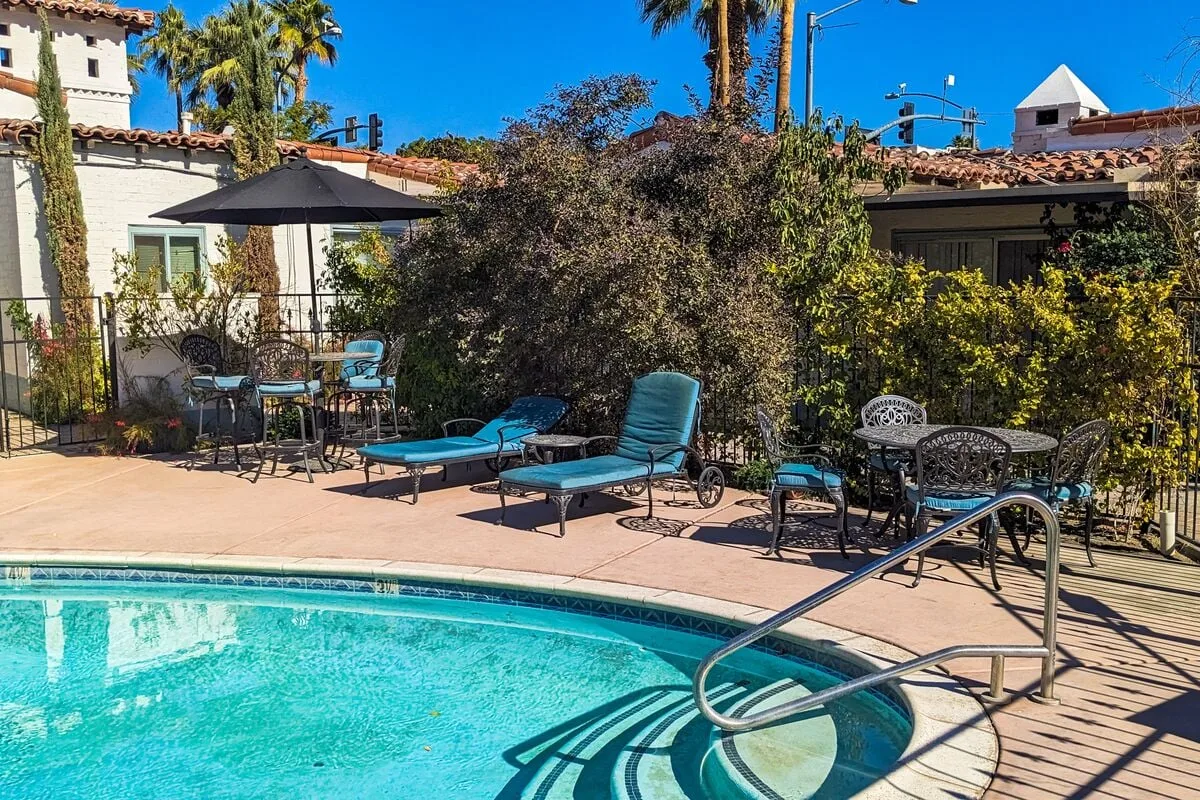 Shared amenity: Outdoor pool area with lounge seating and patio furniture.