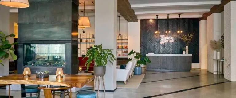 Representative hotel space: Hotel lobby with a reception desk and seating area.