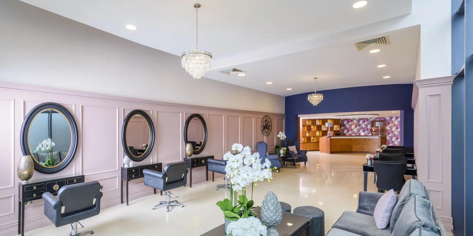 Representative hotel space: A salon interior with styling stations, seating, and a reception counter.
