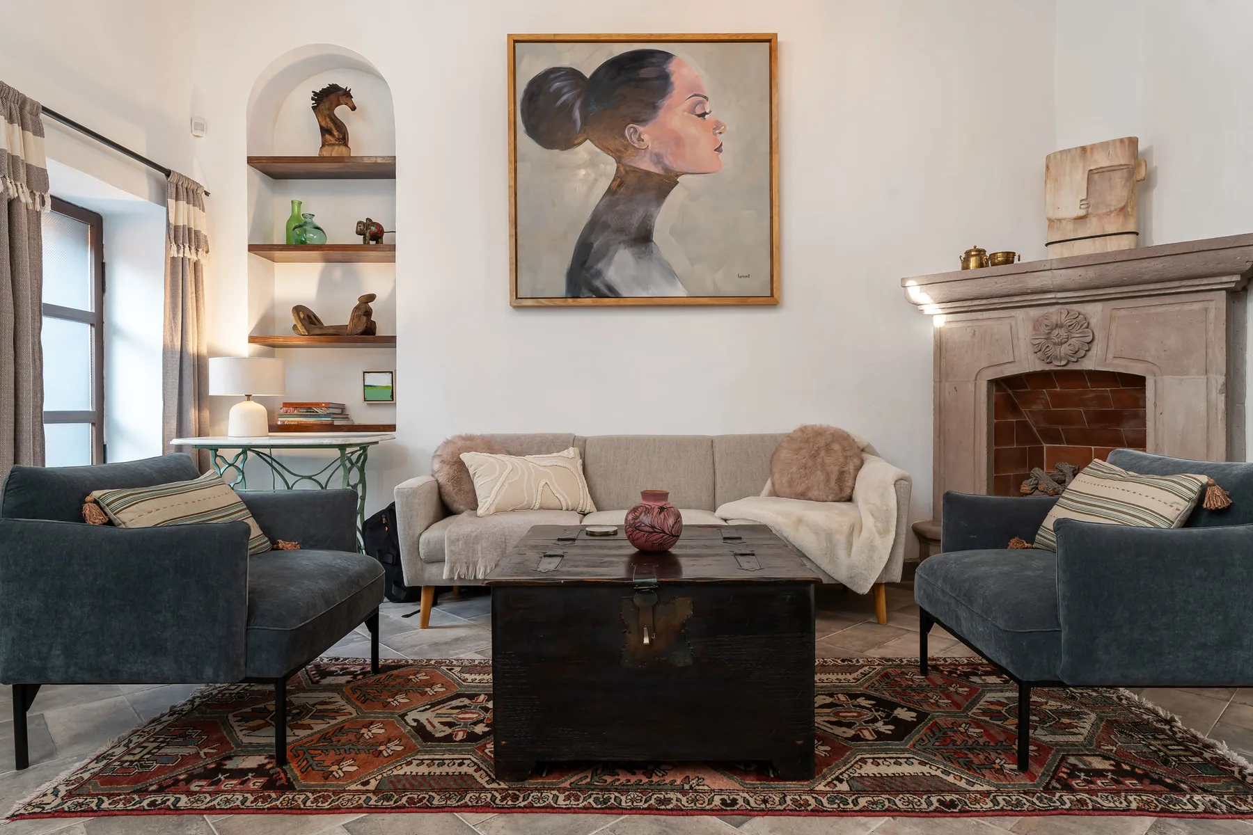 A living room with seating arranged around a low coffee table.