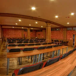 Representative hotel space: A banquet hall with rows of tables and seating.