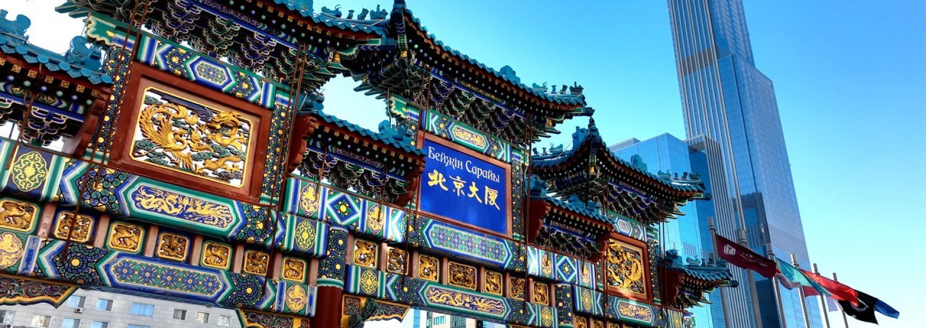 Representative hotel space: An ornate Chinese-style gateway displays colorful painted panels and decorative roof details.