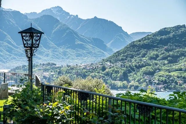 Representative hotel space: A garden terrace overlooks a lake and mountain valley.
