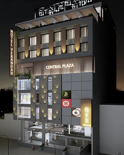 Espacio representativo del hotel: Un moderno edificio de hotel con letreros iluminados y una entrada acristalada.