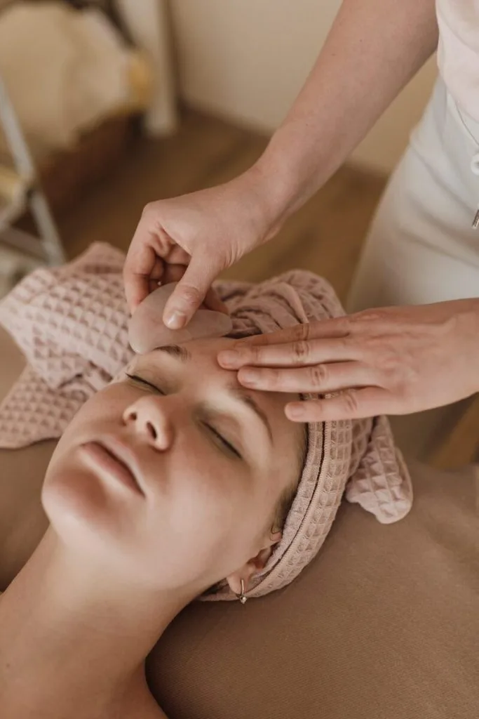 Representative hotel space: A facial treatment is being applied to a person lying on a treatment table.