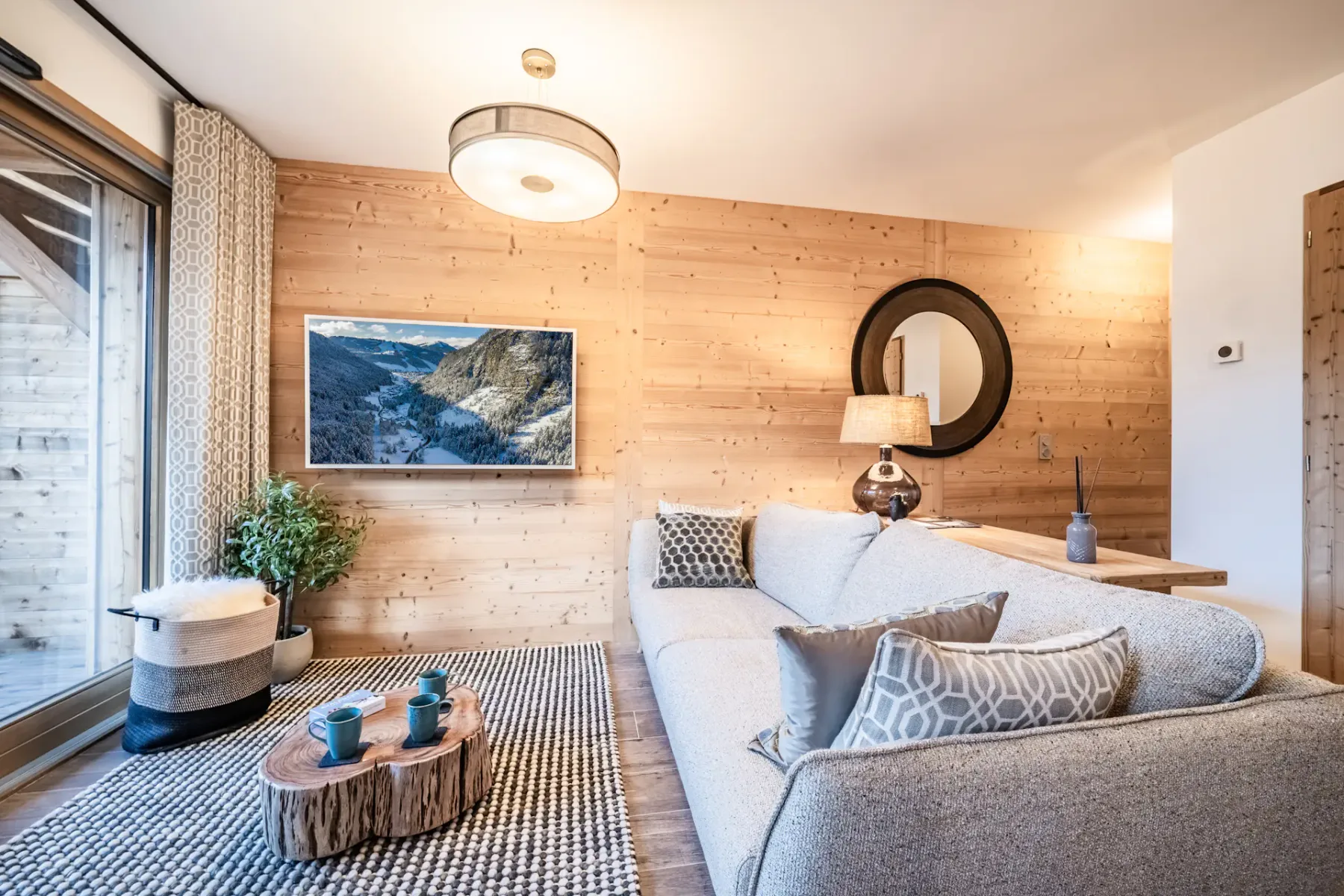 A living room with seating arranged around a low coffee table.