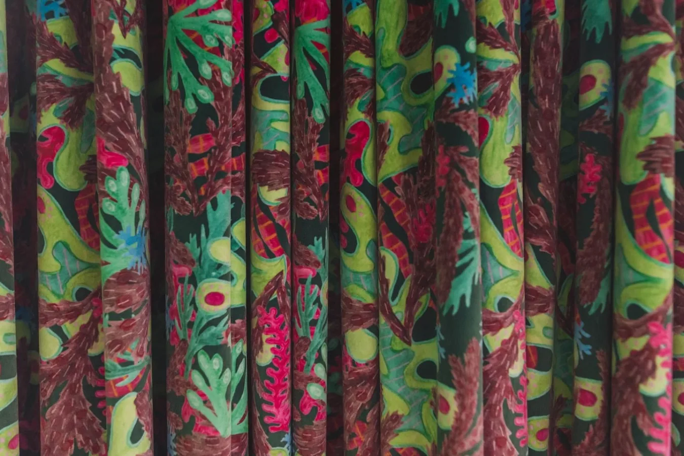 A colorful patterned curtain hangs across the scene.