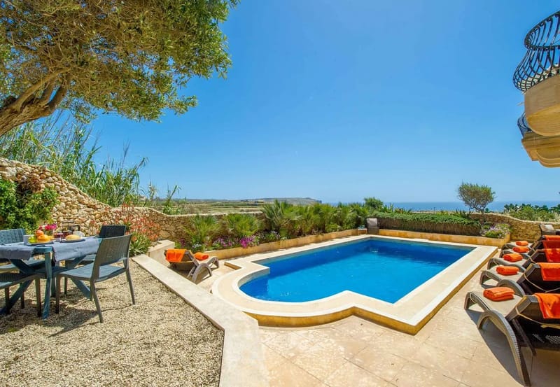 Pool area of Dar il-Bahar holiday home in Gozo