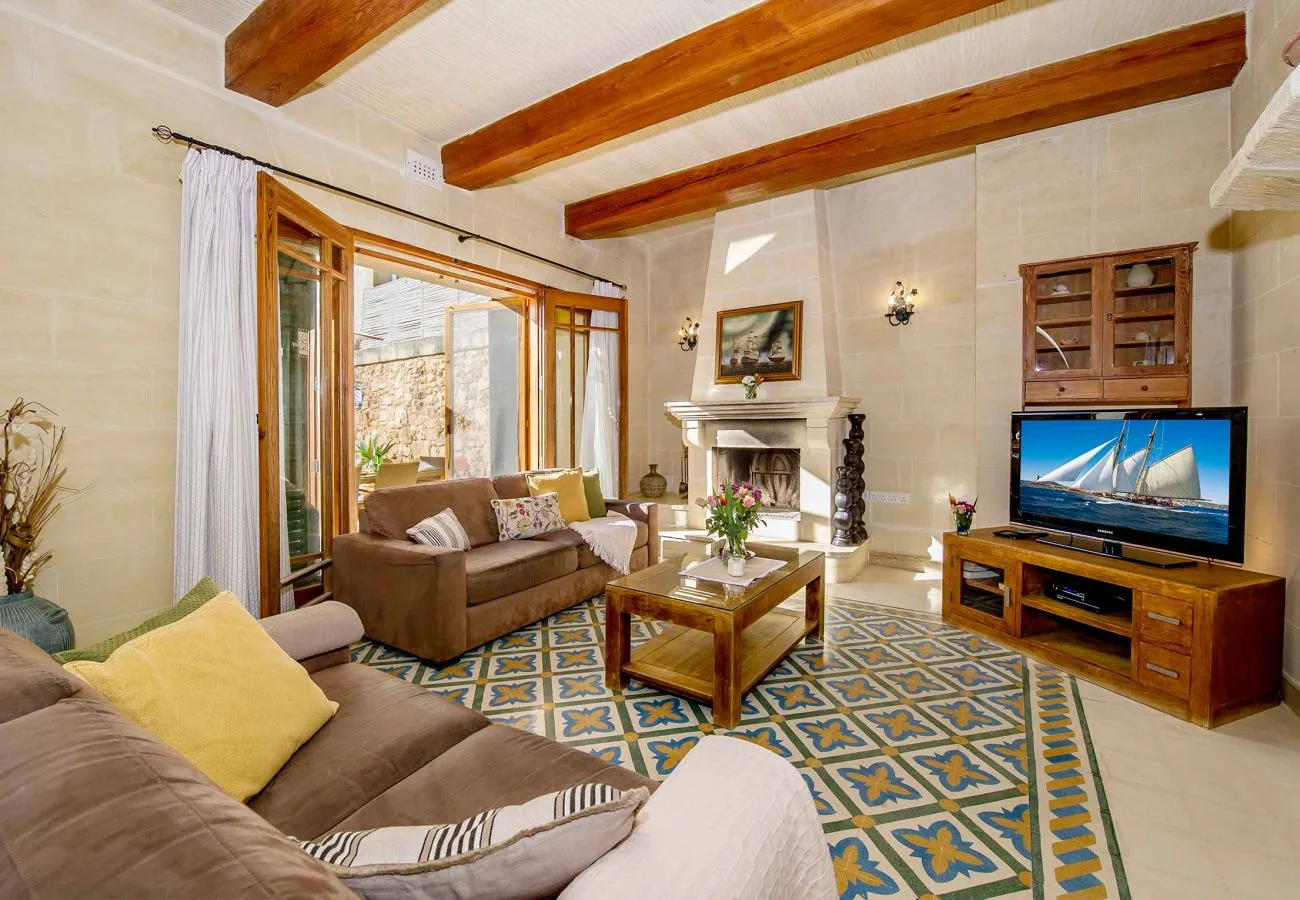 Djar ta' Menzja 3 living room area with fireplace