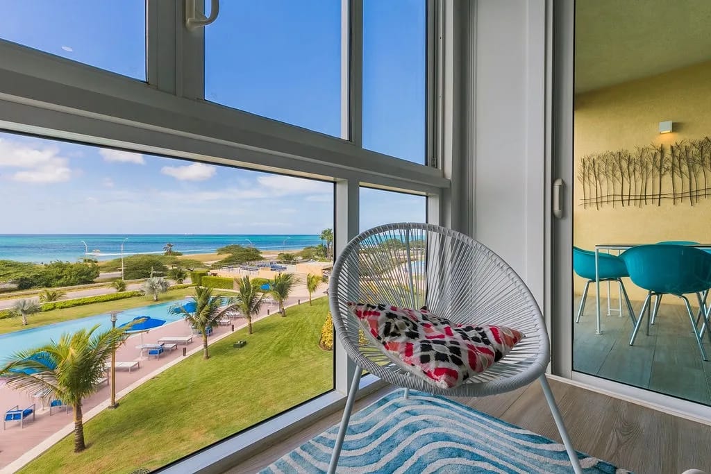 Settle into your cozy window nook and soak in breathtaking ocean and pool views, with tropical breezes and endless blue skies just beyond the glass.