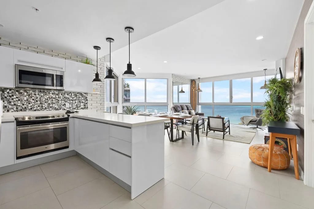 Open-plan kitchen and living area with ocean views