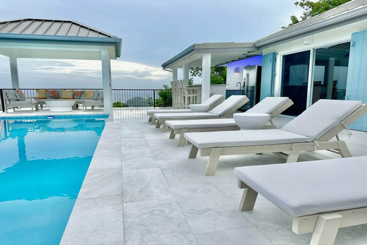 Lounge chairs on the villa's outdoor deck.