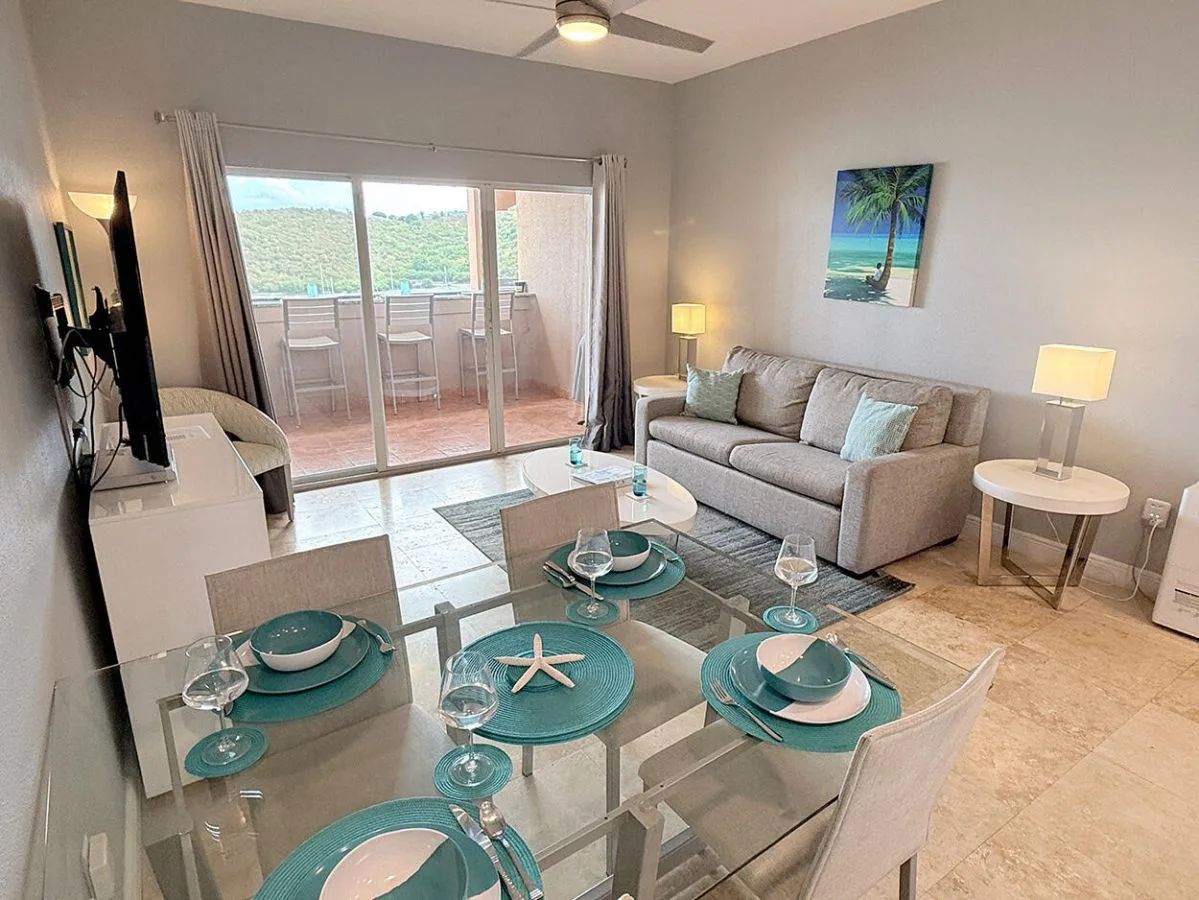 Living and dining area opening to the balcony