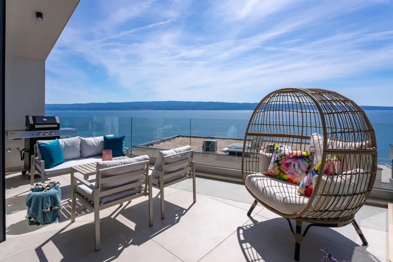 Terraza con zona de estar y barbacoa