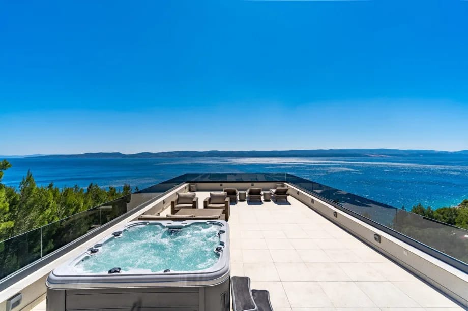 The fully fenced rooftop area with a private heated swimming pool and Jacuzzi