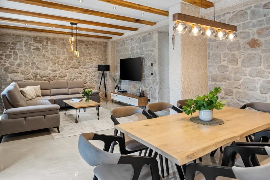 Fully air-conditioned living room with a dining area for 8 people.