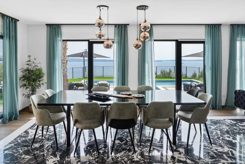 Spacious dining room with a large table and chairs