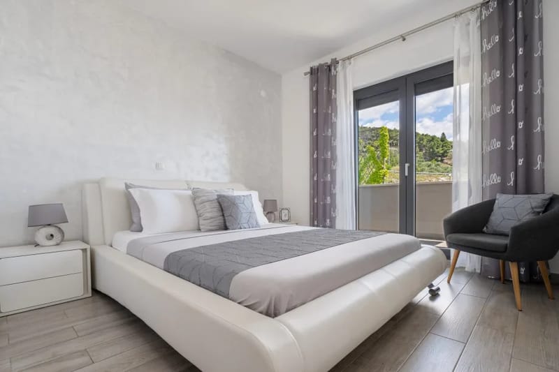 Dormitorio 3 con cama doble, aire acondicionado y baño en suite