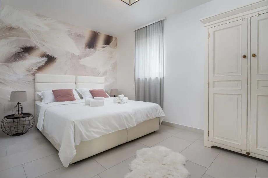 Bedroom No.1 on the ground floor with two single beds 90x200cm, AC, TV