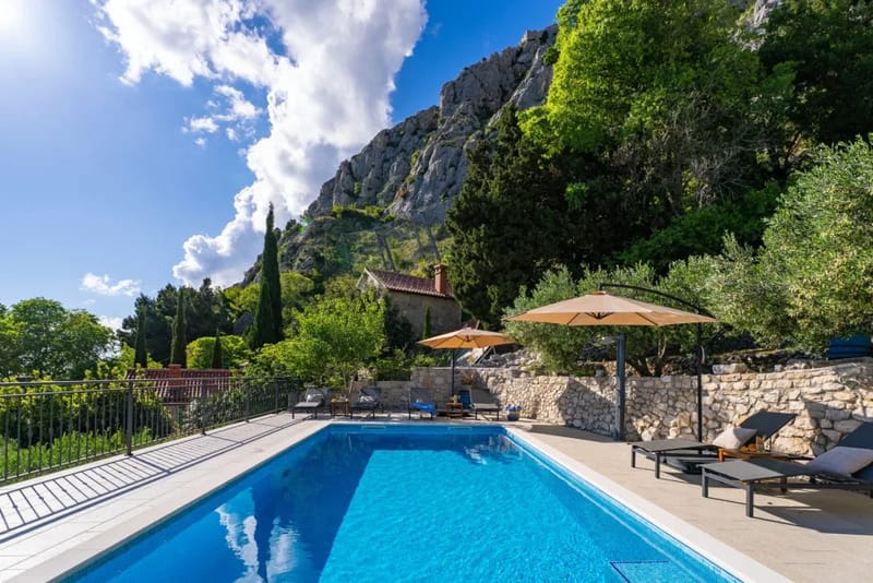 Private heated pool with spacious sun deck
