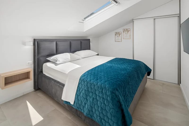 Bedroom with a king-size bed and TV
