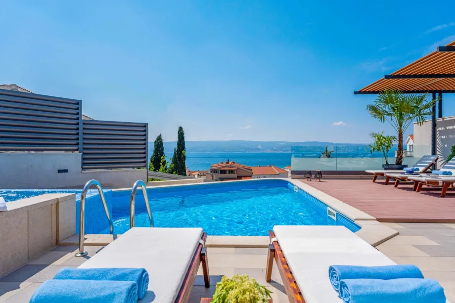 Villa Bane con piscina climatizada privada de 32 m² y jacuzzi, billar y cinco dormitorios con baño privado