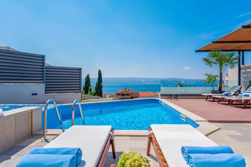 Villa Bane con piscina climatizada privada de 32 m² y jacuzzi, billar y cinco dormitorios con baño privado