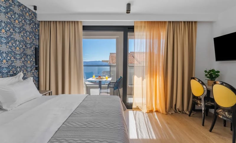Dormitorio 1 con cama queen, aire acondicionado y baño privado