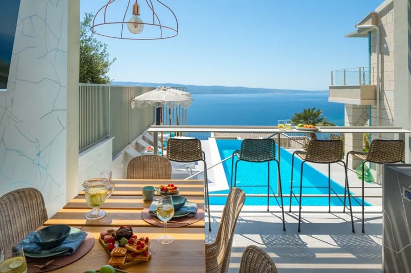 Summer kitchen with barbecue and covered dining space