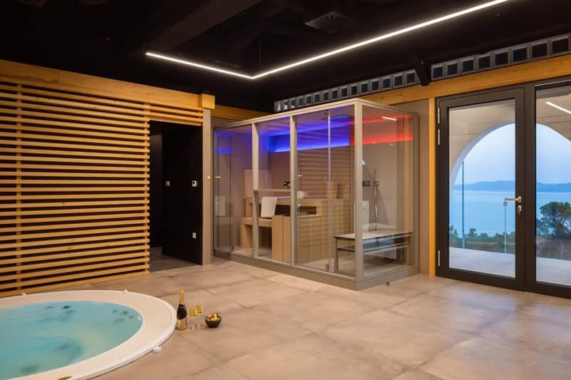 Wellness area with whirlpool, Finnish sauna, steam bath cabin, and relaxing room
