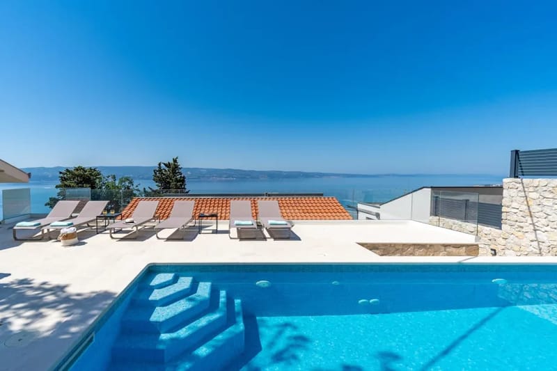 Villa Atopos con piscina privada climatizada, cinco dormitorios y vistas panorámicas al mar