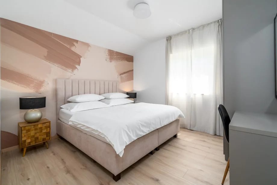 Bedroom with king-size bed and air conditioning