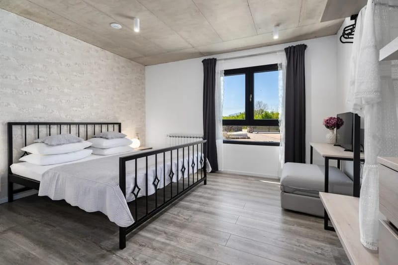 Dormitorio 3 con cama king size y sofá cama