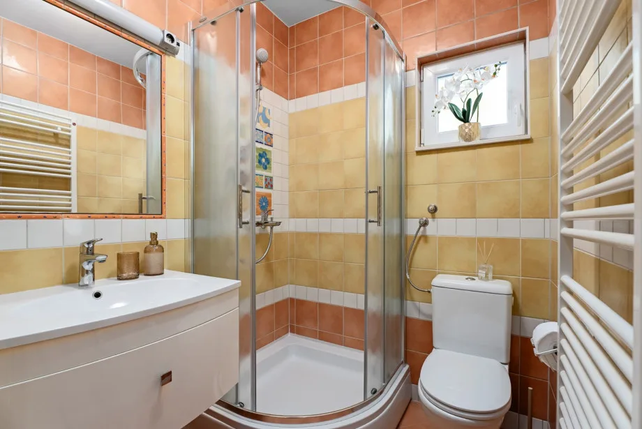 Convenient ground floor bathroom located near the living area.