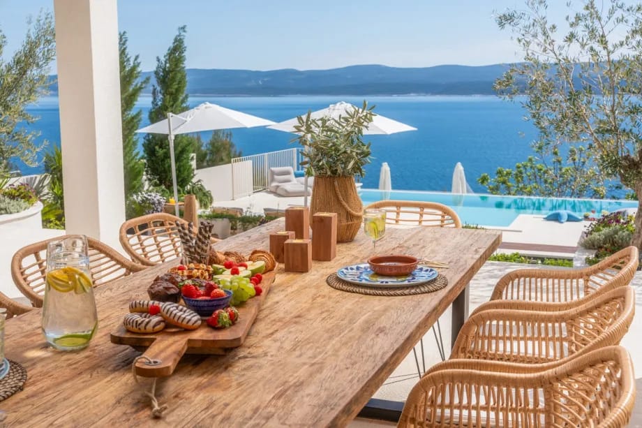 Outdoor dining and barbecue area with table for 10