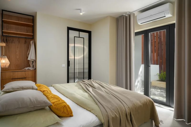 Dormitorio 2 con cama king size y baño privado