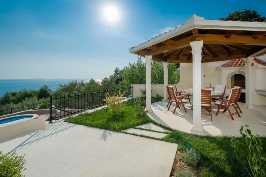 Outdoor dining area with barbecue