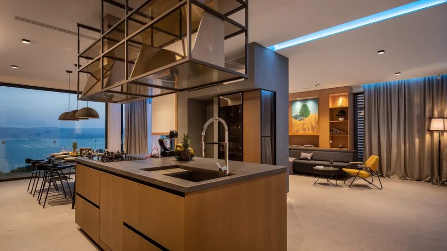 The fully fitted kitchen and dining area offer sea views.
