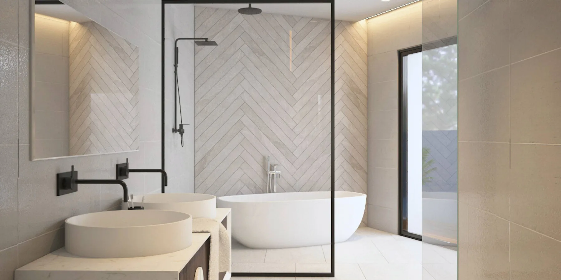 A bathroom with a freestanding bathtub and a glass-enclosed shower.