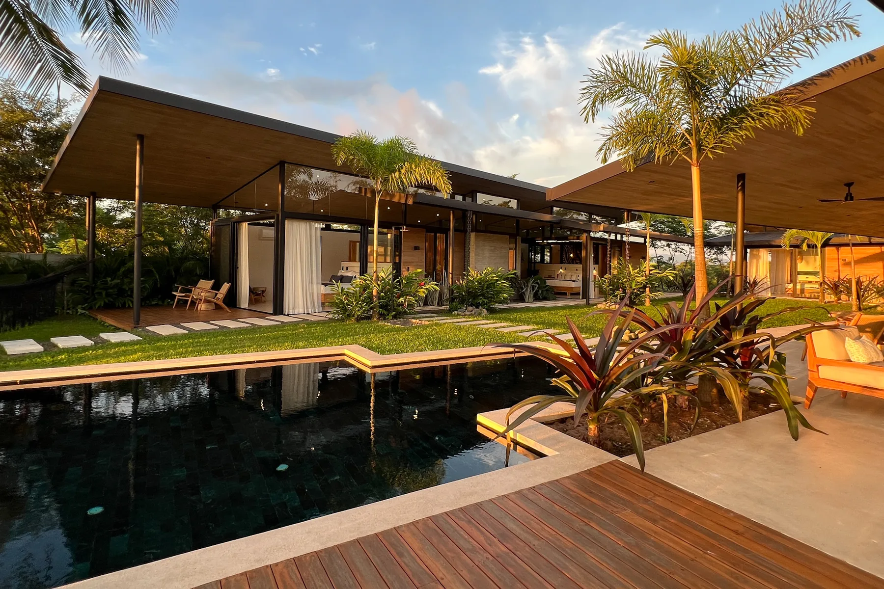 Villa and pool at dusk