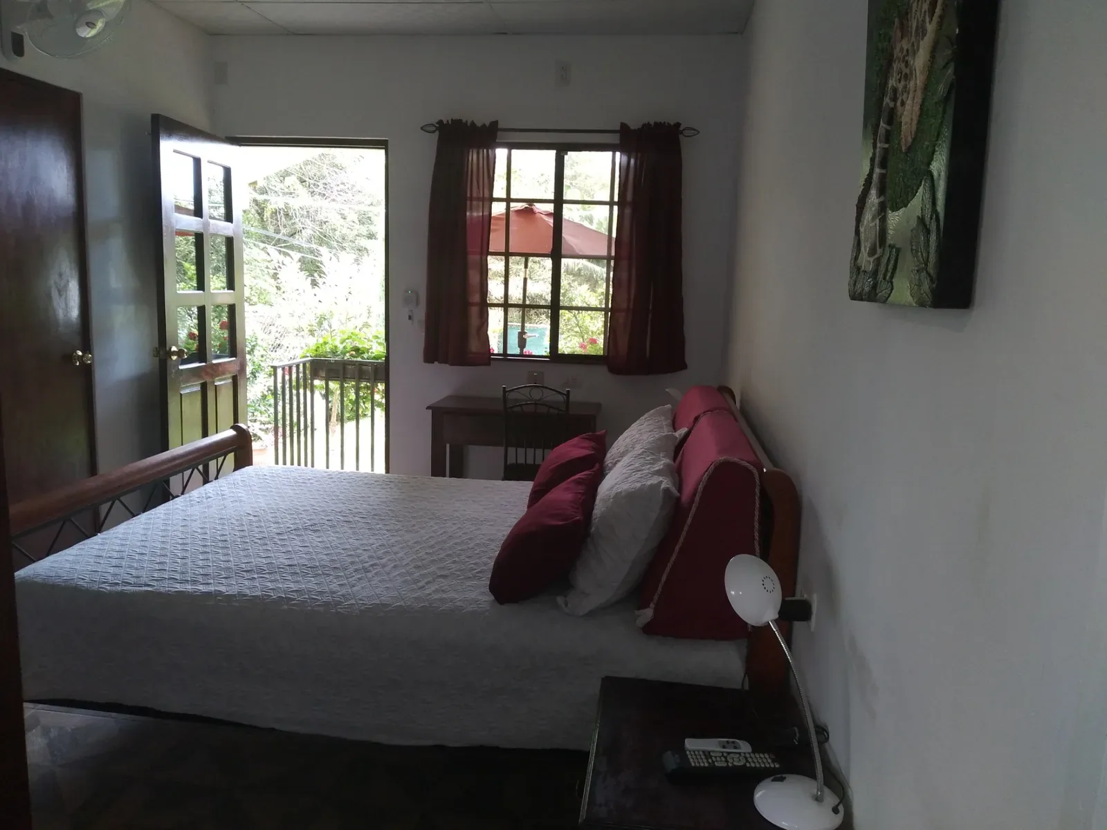 Bedroom opening onto the terrace and garden