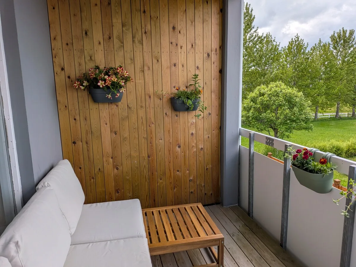 Private balcony overlooking green space